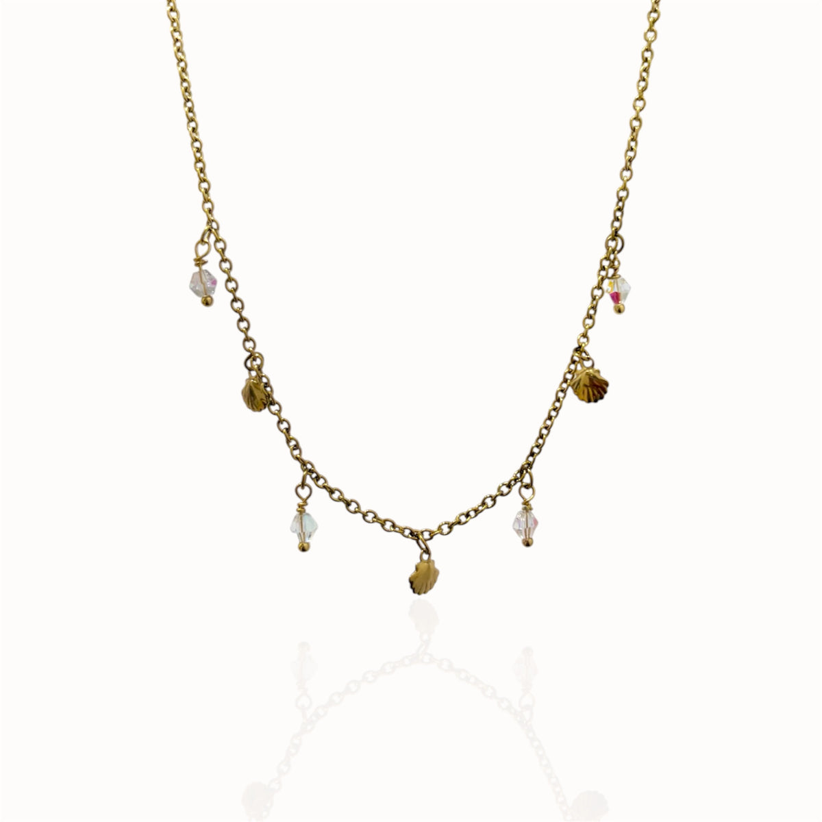 Collier petites breloques et cristaux doré